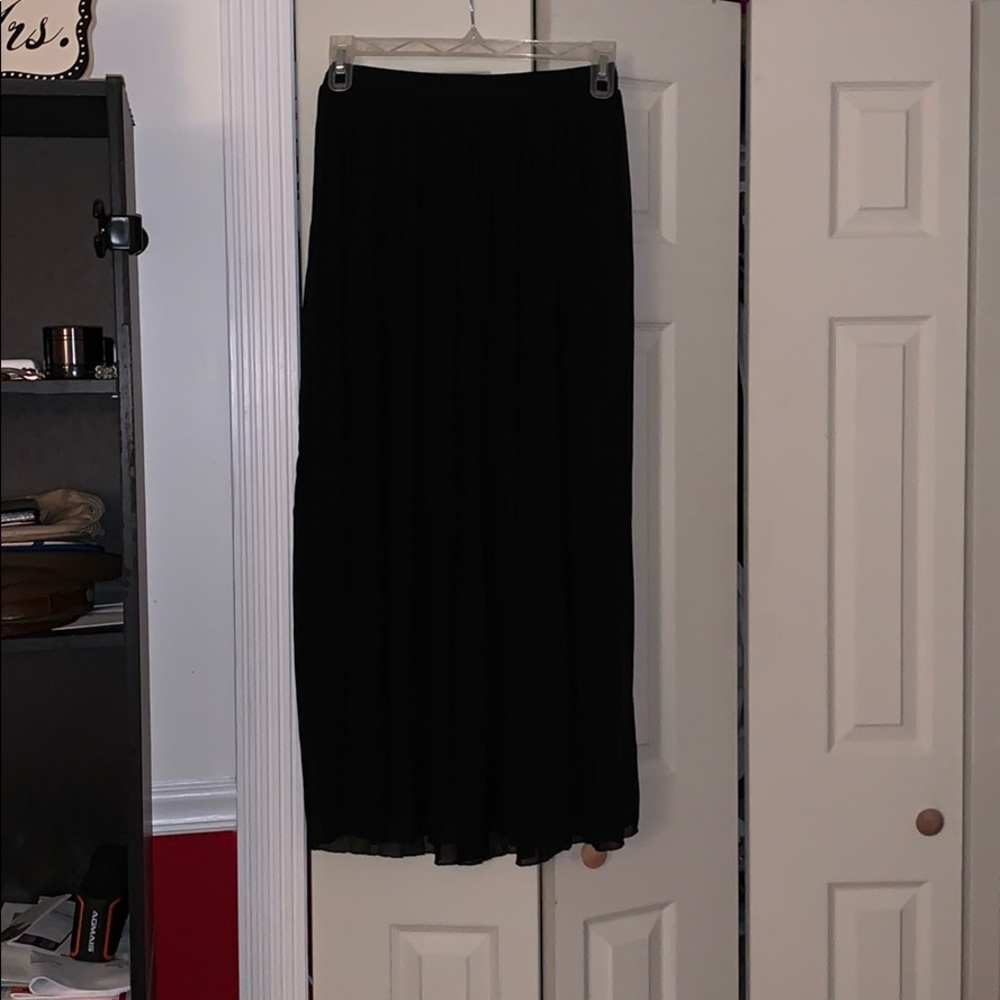 Black pleated maxi skirt.